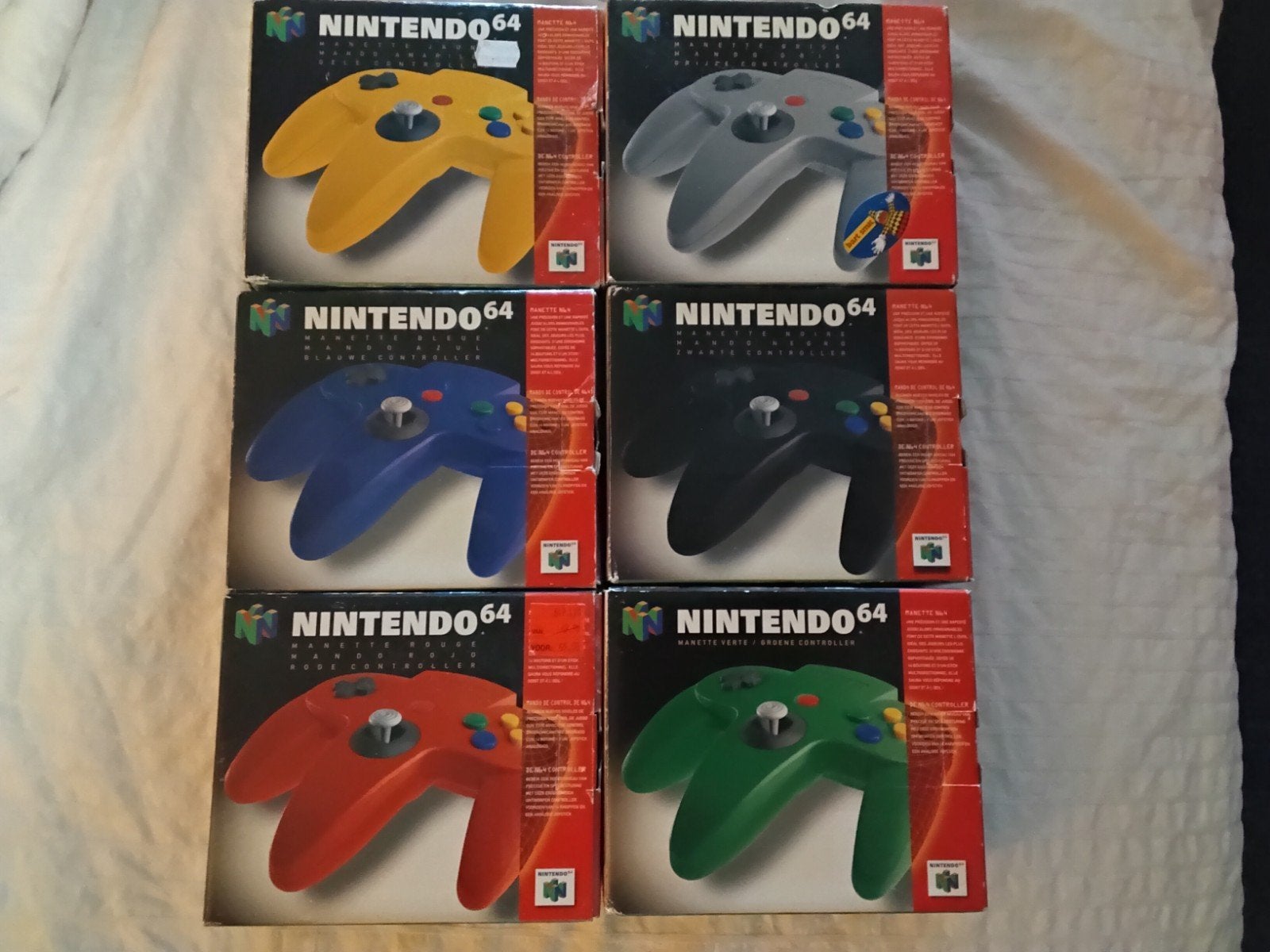Nintendo 64 controllers (diverse kleuren), Ophalen of Verzenden, Zo goed als nieuw, Met 3 controllers of meer