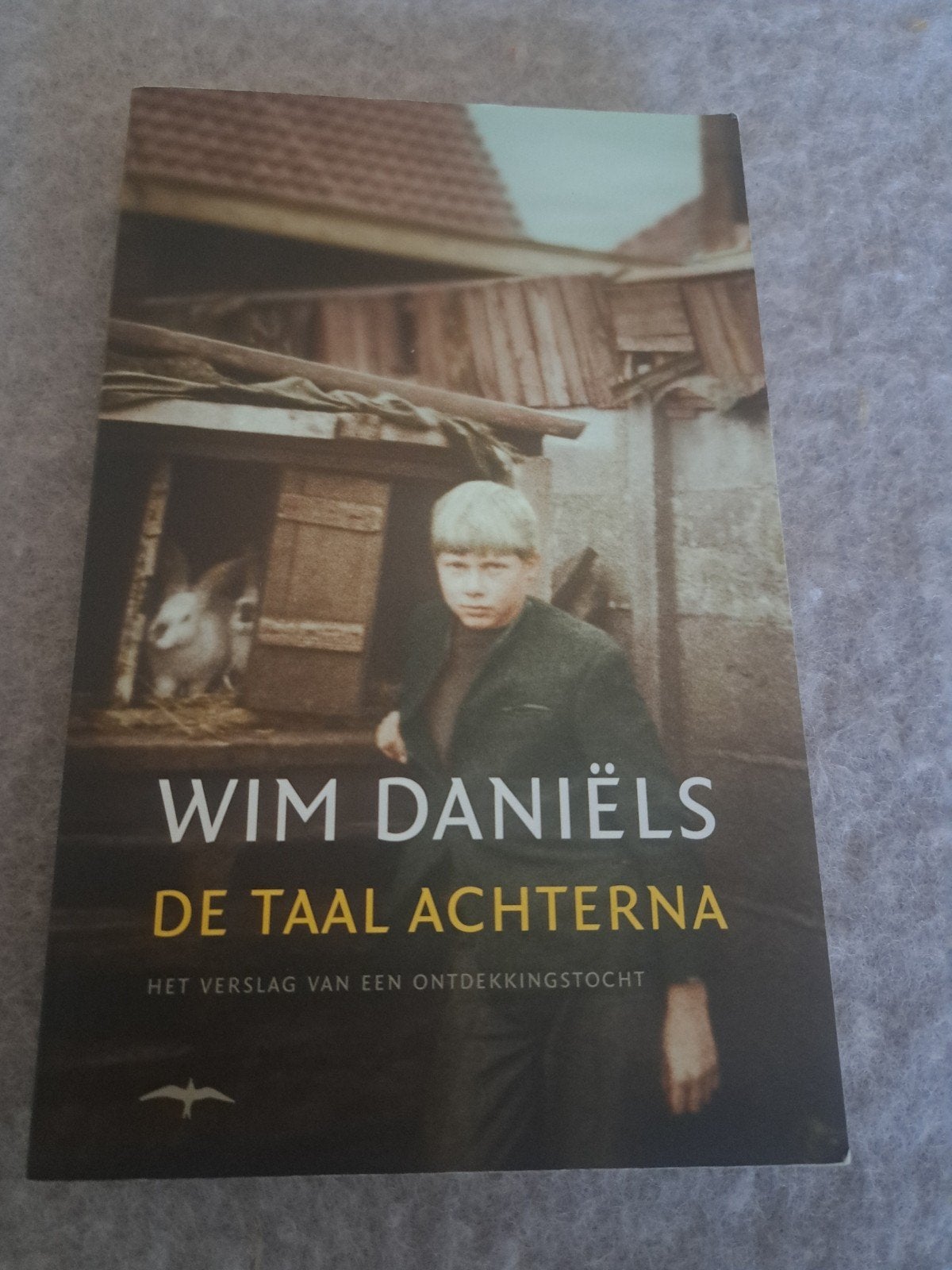 Wim Daniëls - De taal achterna, Ophalen of Verzenden, Zo goed als nieuw, Wim Daniëls