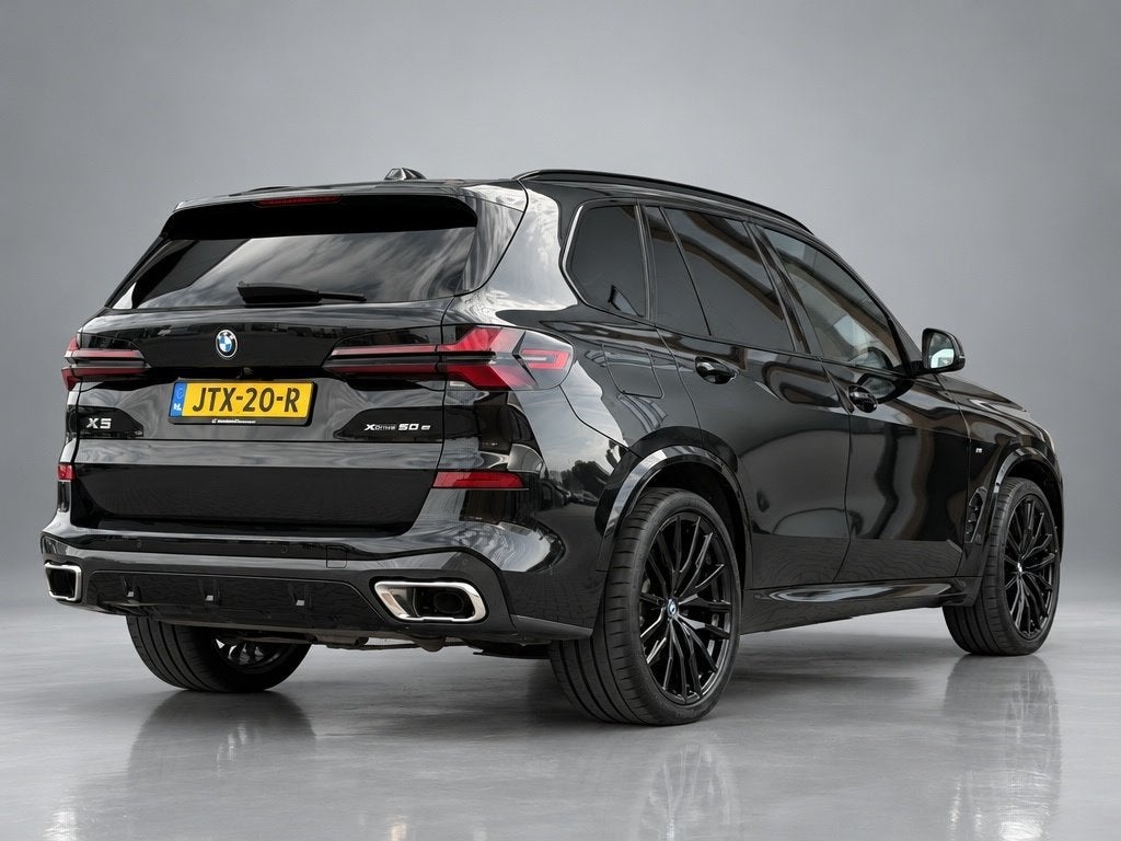 Bmw X5 xDrive 50e M-Sport | Panoramadak |Driving Assistant |, Gebruikt, 2395 kg, Zwart, Bedrijf
