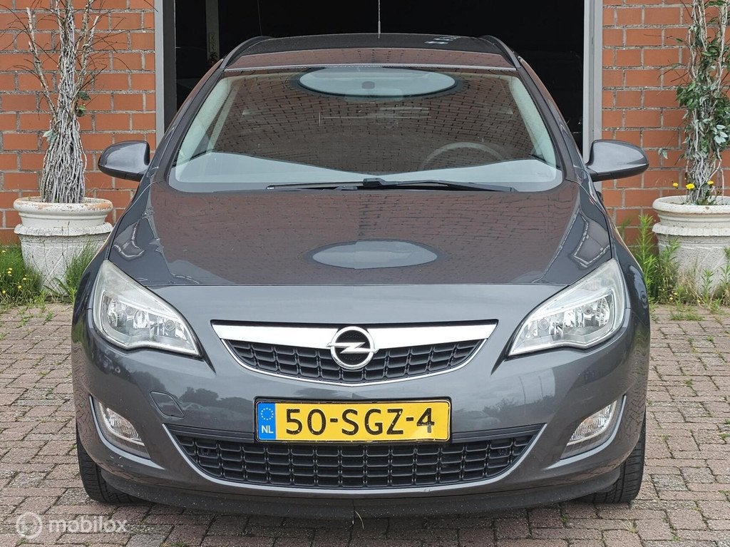 Opel Astra Sports Tourer 1.4 Edition, Auto's, Opel, Voorwielaandrijving, Euro 5, 101 pk, Gebruikt