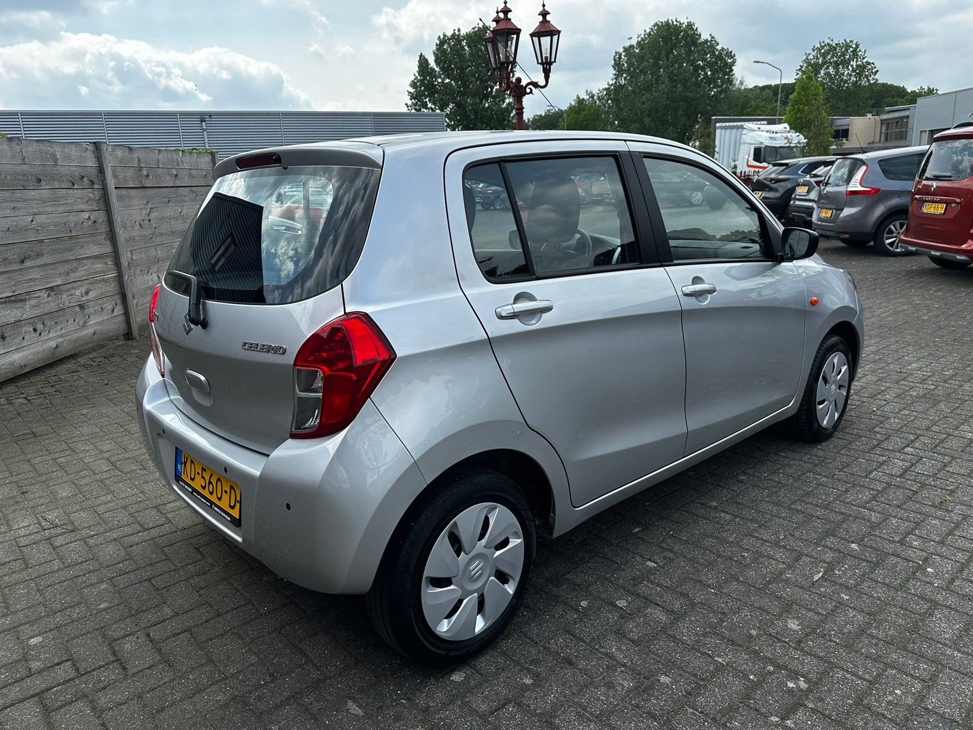 Suzuki Celerio 1.0 Comfort Automaat | Airco, Auto's, Dealer onderhouden, Stof, Gebruikt, Met garantie (alle)