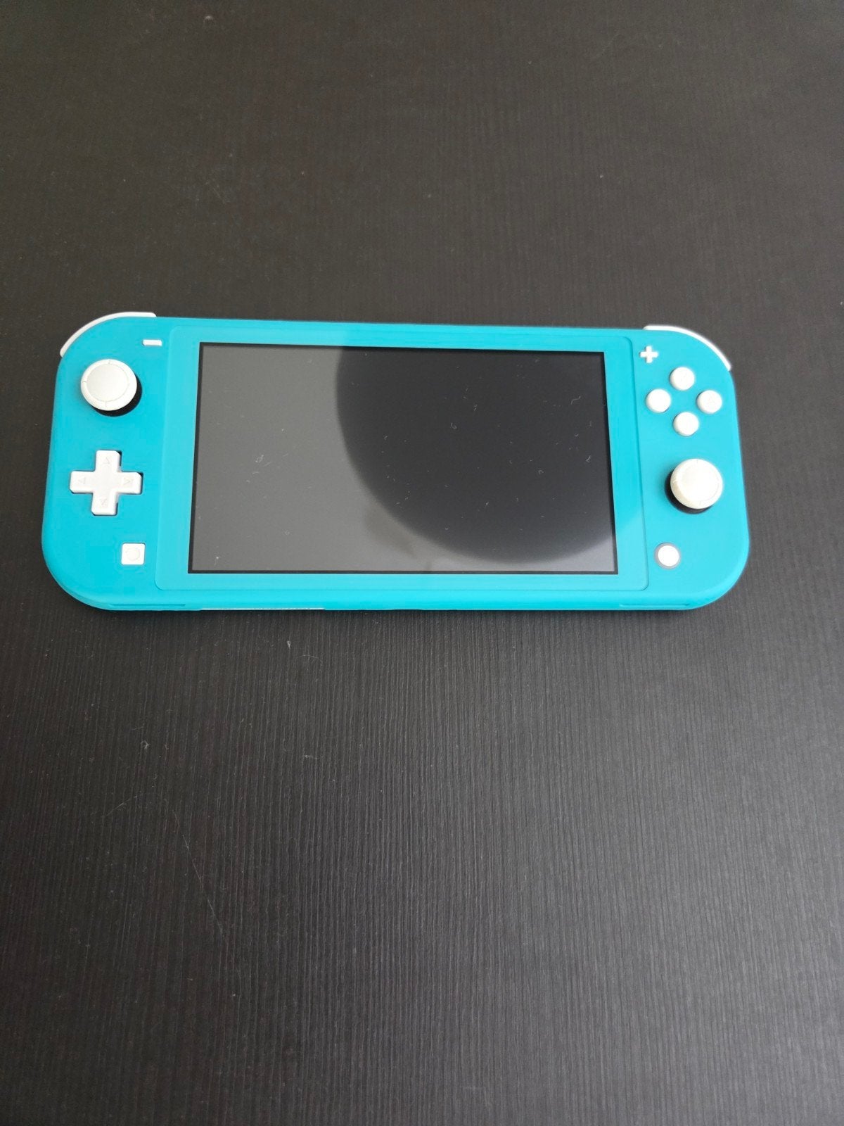 Nintendo Switch Lite Turquoise - Zo goed als nieuw, Spelcomputers en Games, Spelcomputers | Nintendo Switch Lite, Ophalen of Verzenden
