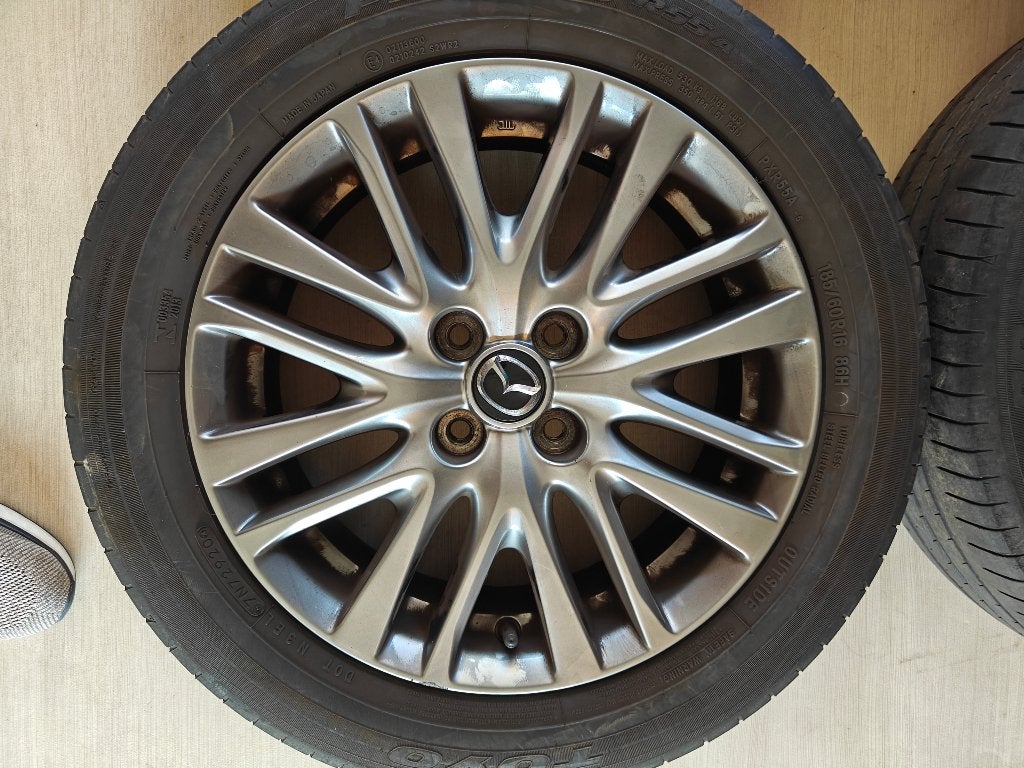 Originele 16" Mazda2 velgen (2021) 4x100 gunmetal, Auto-onderdelen, Banden en Velgen, Gebruikt, Velg(en), 16 inch, Personenwagen