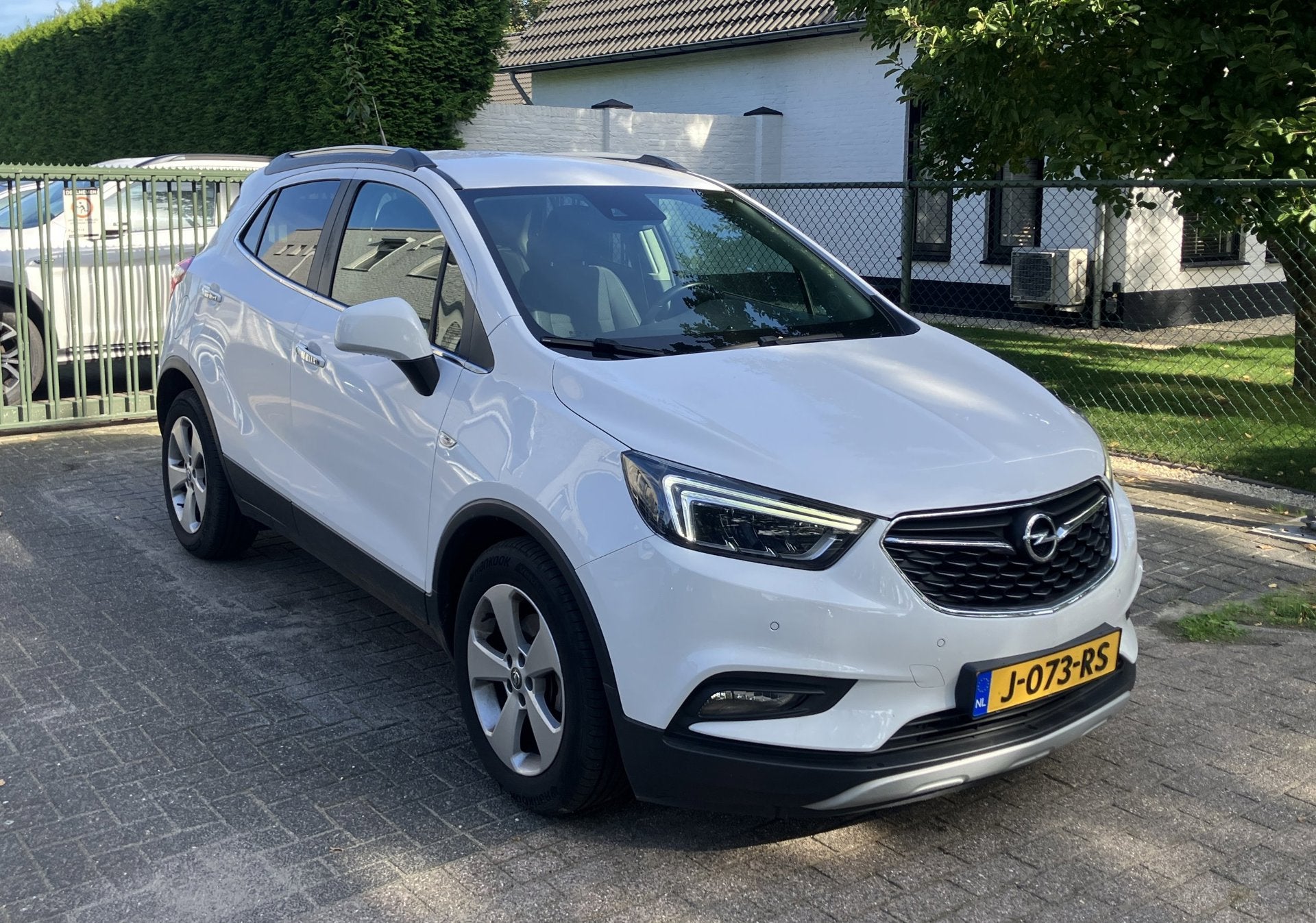 Opel Mokka X 1.4 Turbo Innovation, Auto's, Gebruikt, Euro 6, Leder en Stof, Wit