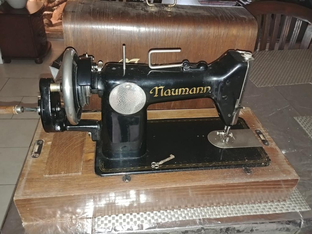 Naumann naaimachine, Ophalen