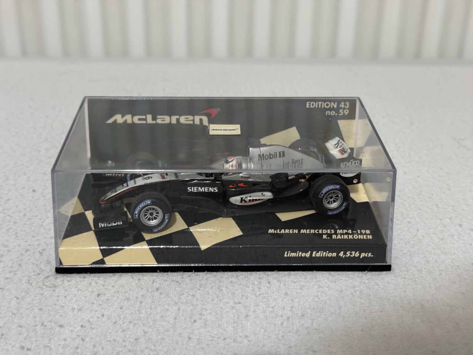 1:43 McLaren Mercedes MP4-19B Raikkonen Minichamps, Ophalen of Verzenden, Zo goed als nieuw, Auto, MiniChamps