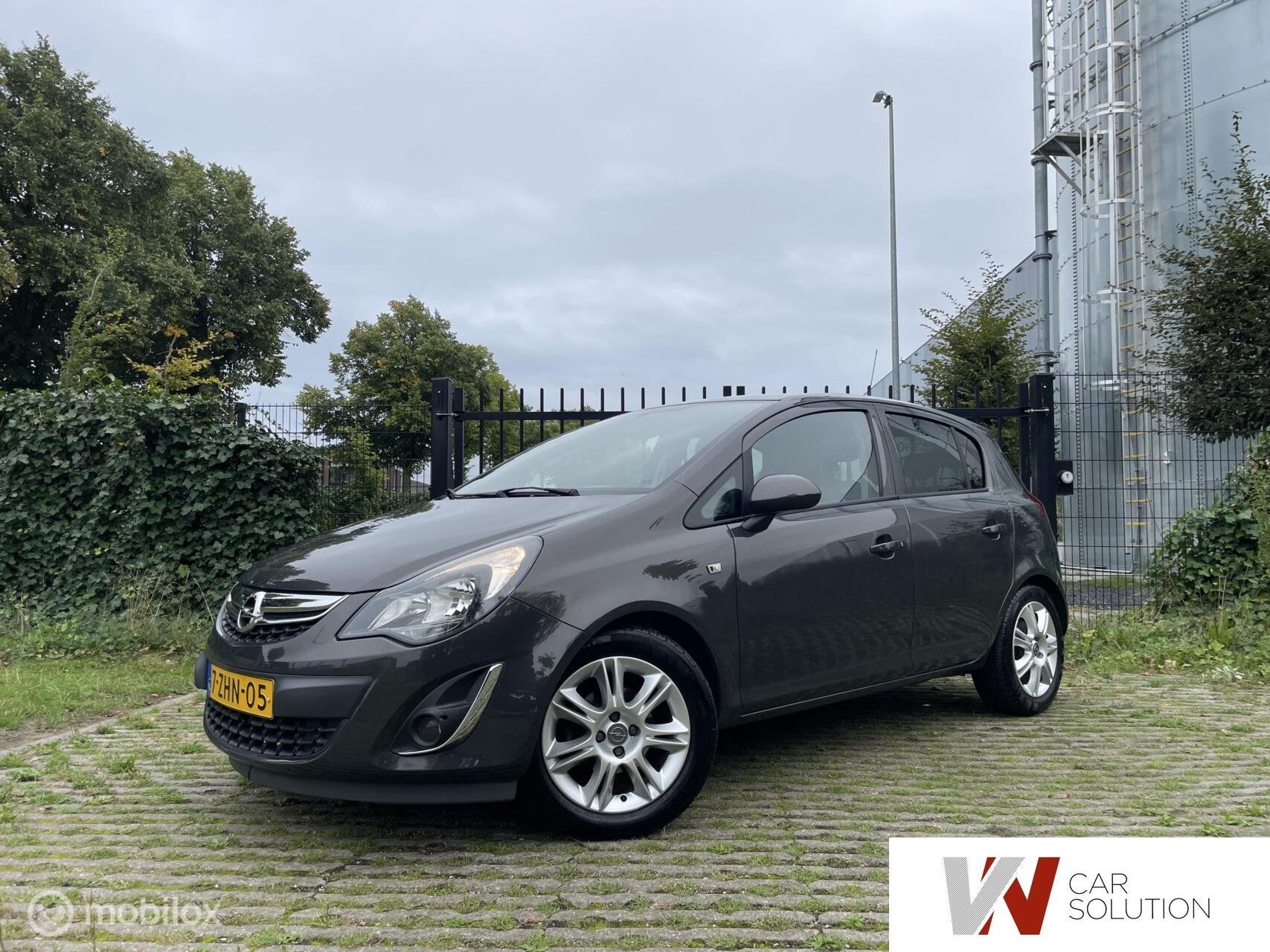 Opel Corsa 1.4-16V Cosmo NL AUTO NAVI PDC CLIMA SPORT BOEKJE, Voorwielaandrijving, Euro 5, Gebruikt, 4 cilinders