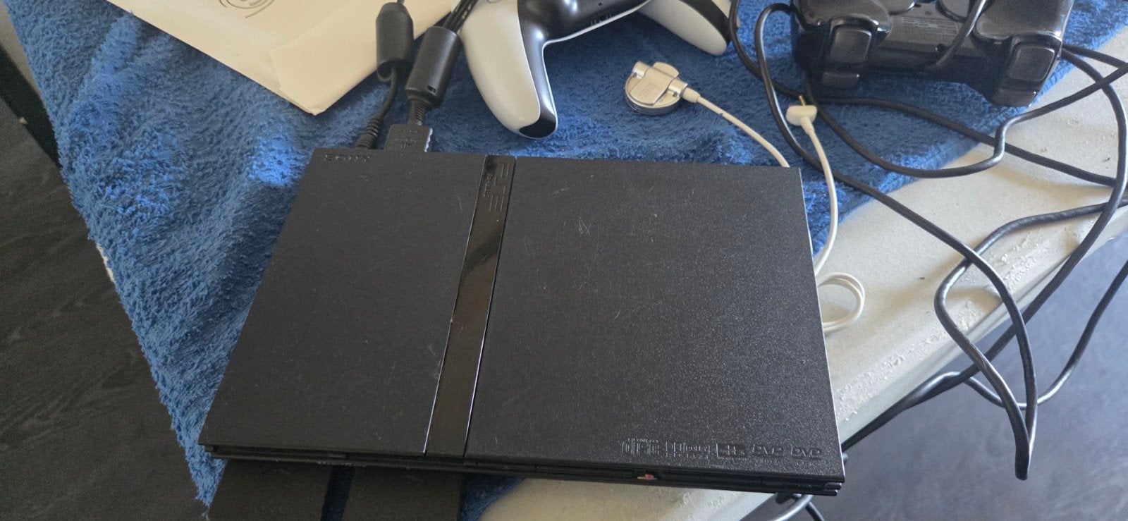 Goedwerkende PS2 set + 4 controllers en 15 games, Spelcomputers en Games, Spelcomputers | Sony PlayStation 2, Gebruikt, Slim, Zwart