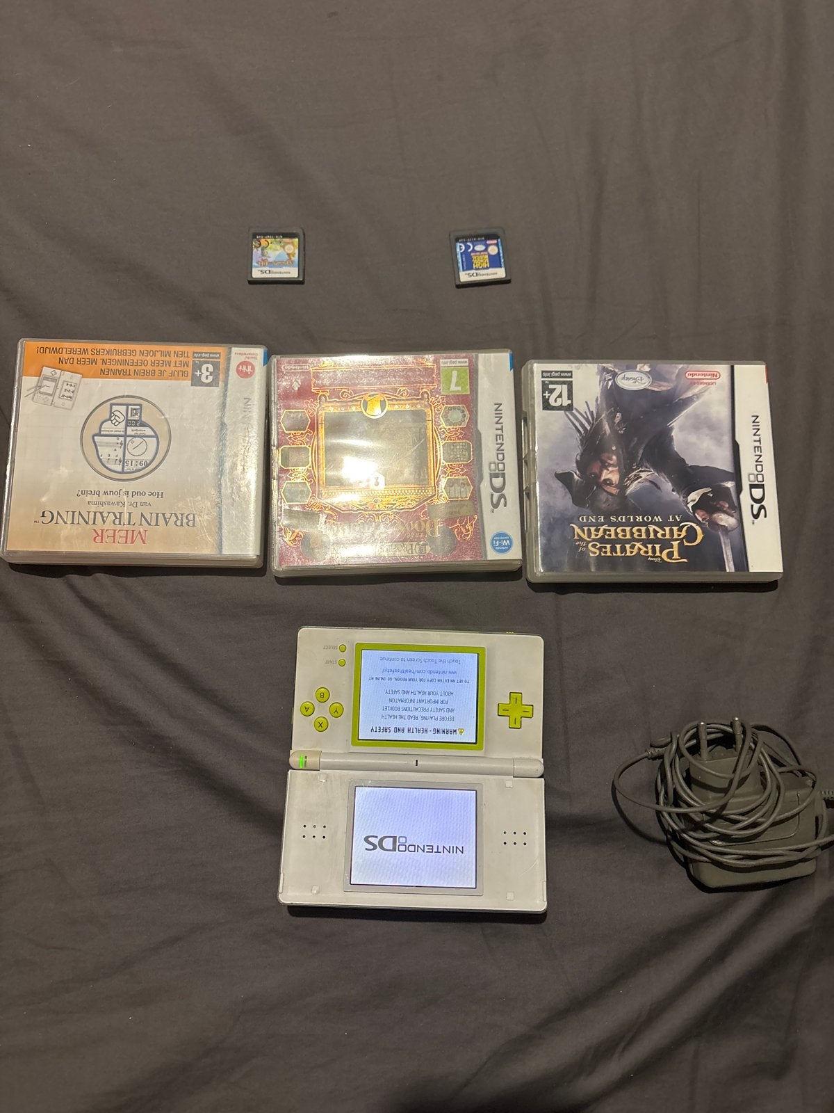 Nintendo DS Lite met 5 games en oplader, Ophalen of Verzenden, Groen, DS Lite, Gebruikt