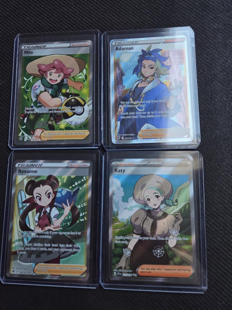 Hits Astral Radiance en Scarlet en Violet, Ophalen of Verzenden, Zo goed als nieuw, Meerdere kaarten, Foil