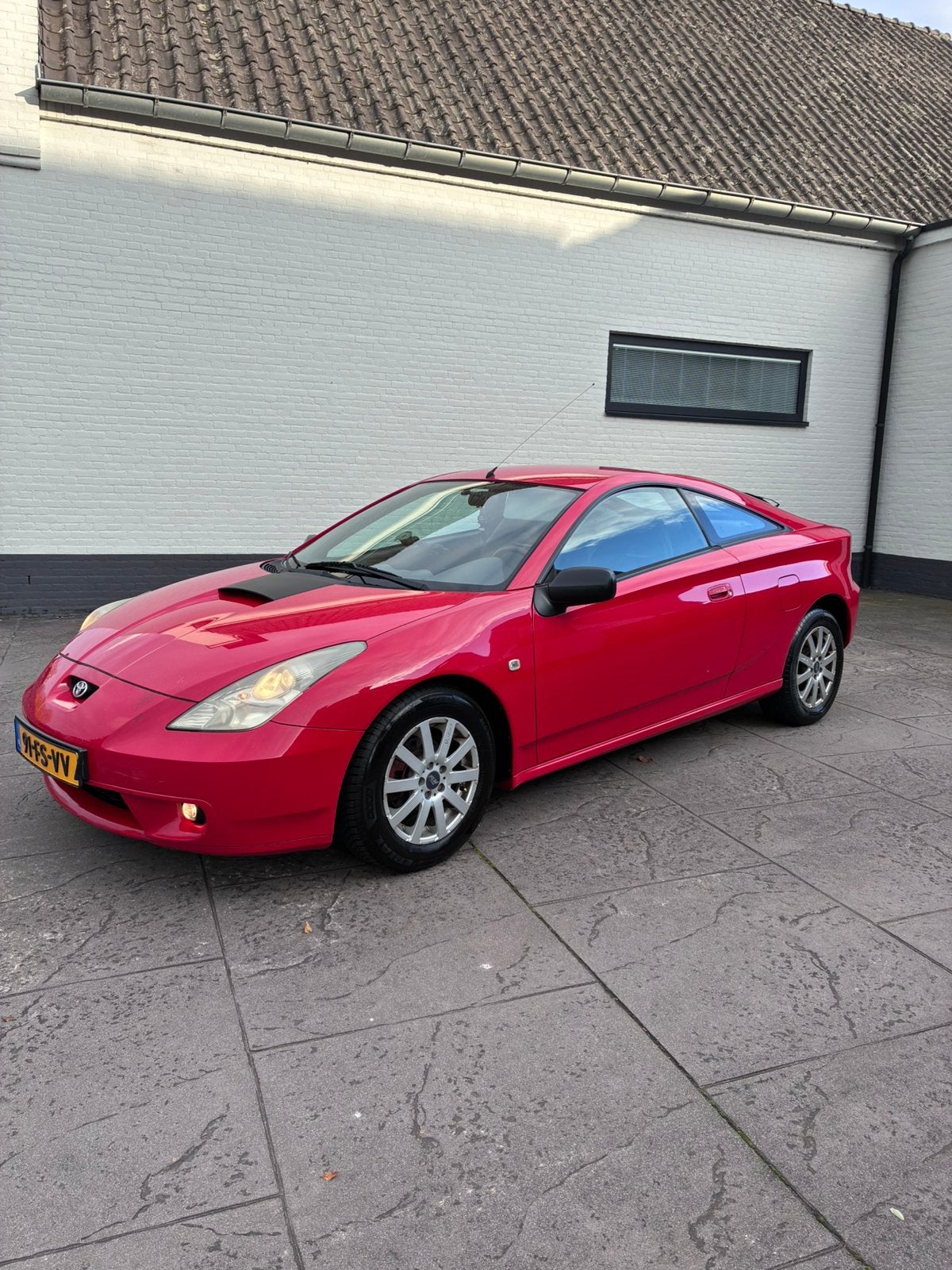 Toyota Celica 1.8 16V Vvti 2000 rood 2e EIG AIRCO LEER APK N, 1794 cc, Elektrische ramen, Zwart, 4 stoelen