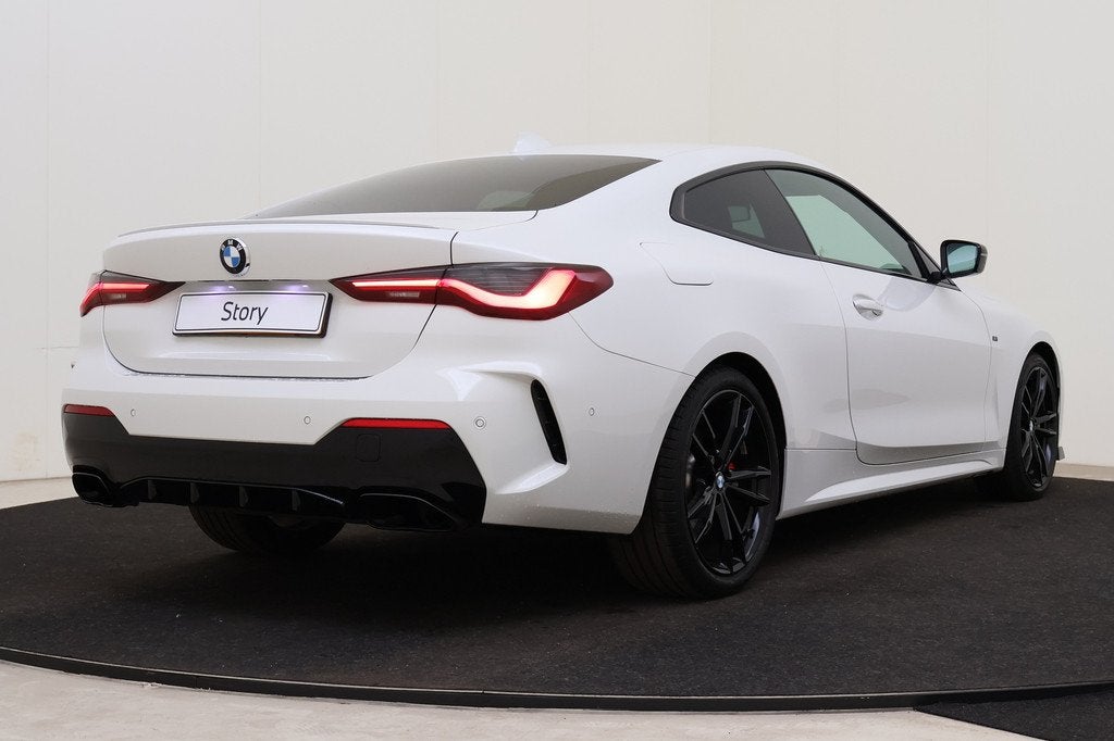 BMW 4 Serie Coupé 420i M Sport Automaat / Achteruitrijcamer, 1998 cc, Achterwielaandrijving, Gebruikt, Met garantie (alle)