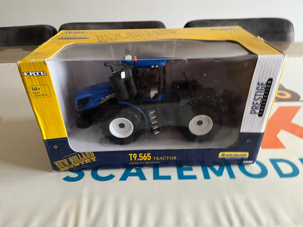 New Holland T9.565 kniktrekker Ertl 13858, Ophalen of Verzenden, Zo goed als nieuw, Tractor of Landbouw, ERTL
