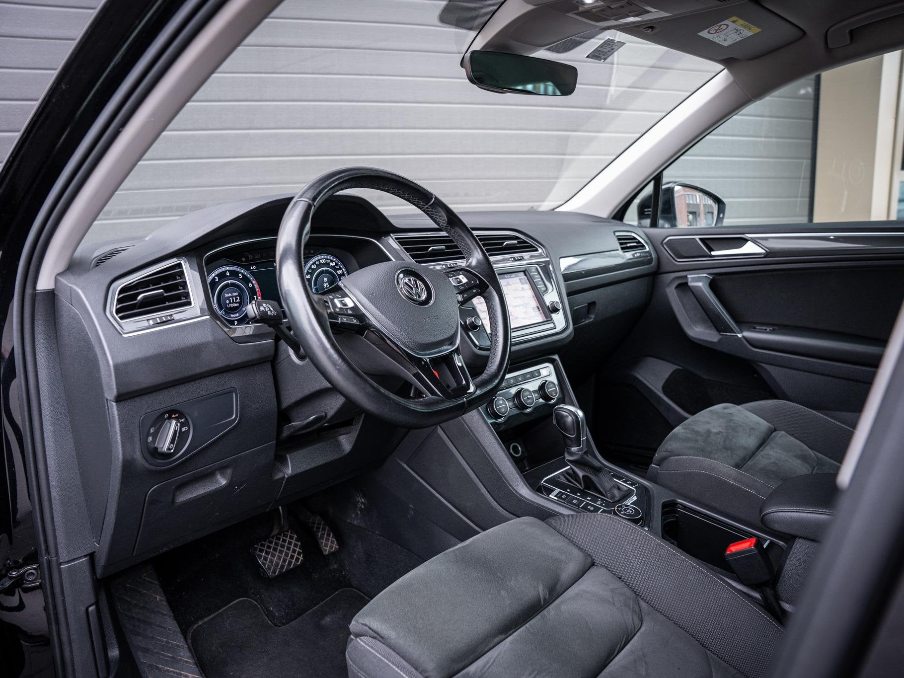 Volkswagen Tiguan 2.0 TSI 4Motion Highline, Auto's, Automaat, Stof, Gebruikt, 4 cilinders