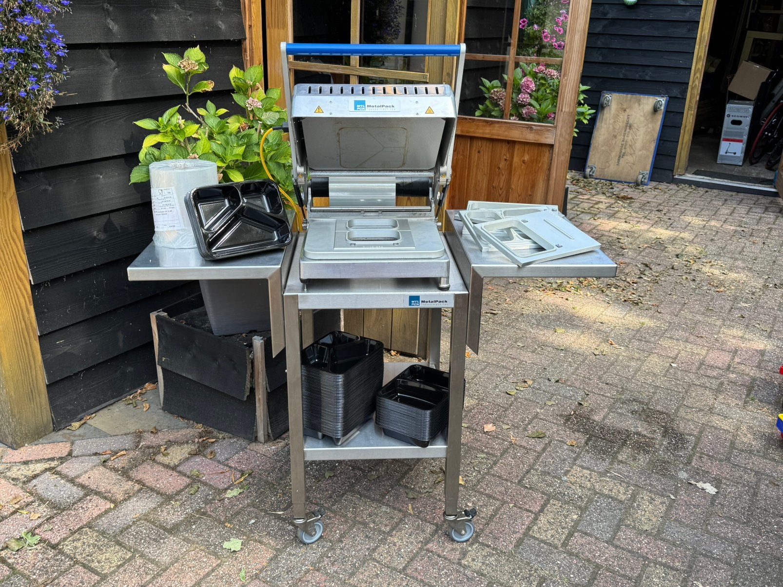 Metalpack topsealmachine met toebehoren, Ophalen
