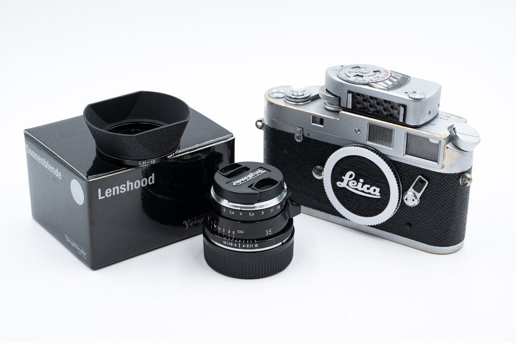 Leica M4 + Voigtländer 35mm f/2 Ultron VM II + Extra's, Audio, Tv en Foto, Fotocamera's Analoog, Ophalen of Verzenden, Gebruikt