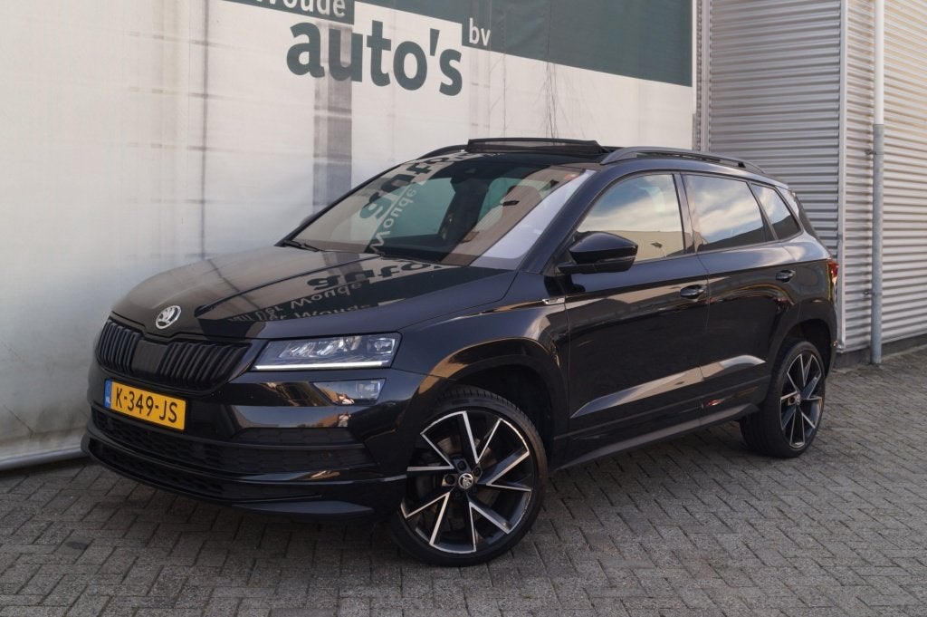 Skoda Karoq 1.5 TSI 150pk DSG Sportline Business -PANO-ECC-N, Auto's, Skoda, Automaat, Stof, 4 cilinders, 150 pk