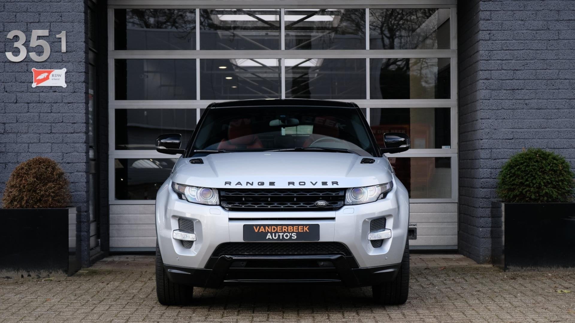 Land Rover Range Rover Evoque Coupé 2.0 Si 4WD Prestige Dyn, Auto's, Land Rover, Automaat, Zwart, 4 cilinders, 4 stoelen