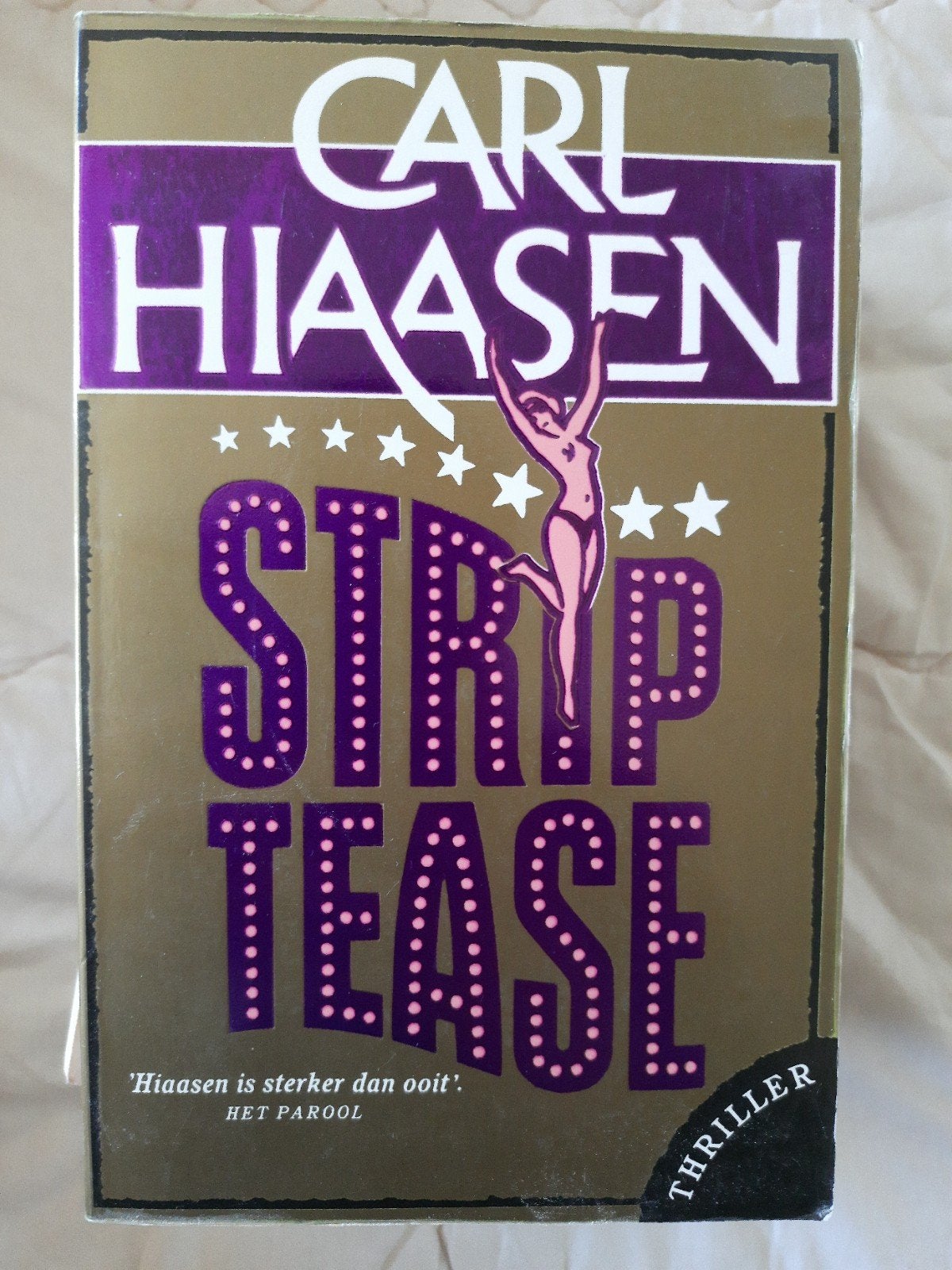 Carl Hiaasen - Striptease, Boeken, Thrillers, Gelezen, Ophalen of Verzenden