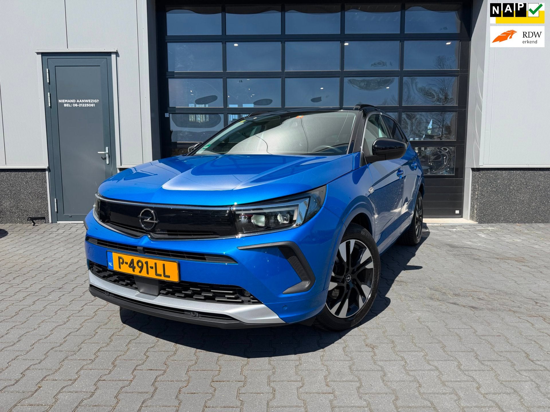 Opel Grandland 1.2 Turbo Business Elegance 1 ste eigenaar VO, Auto's, Opel, Gebruikt, 1199 cc, Blauw, Leder en Stof