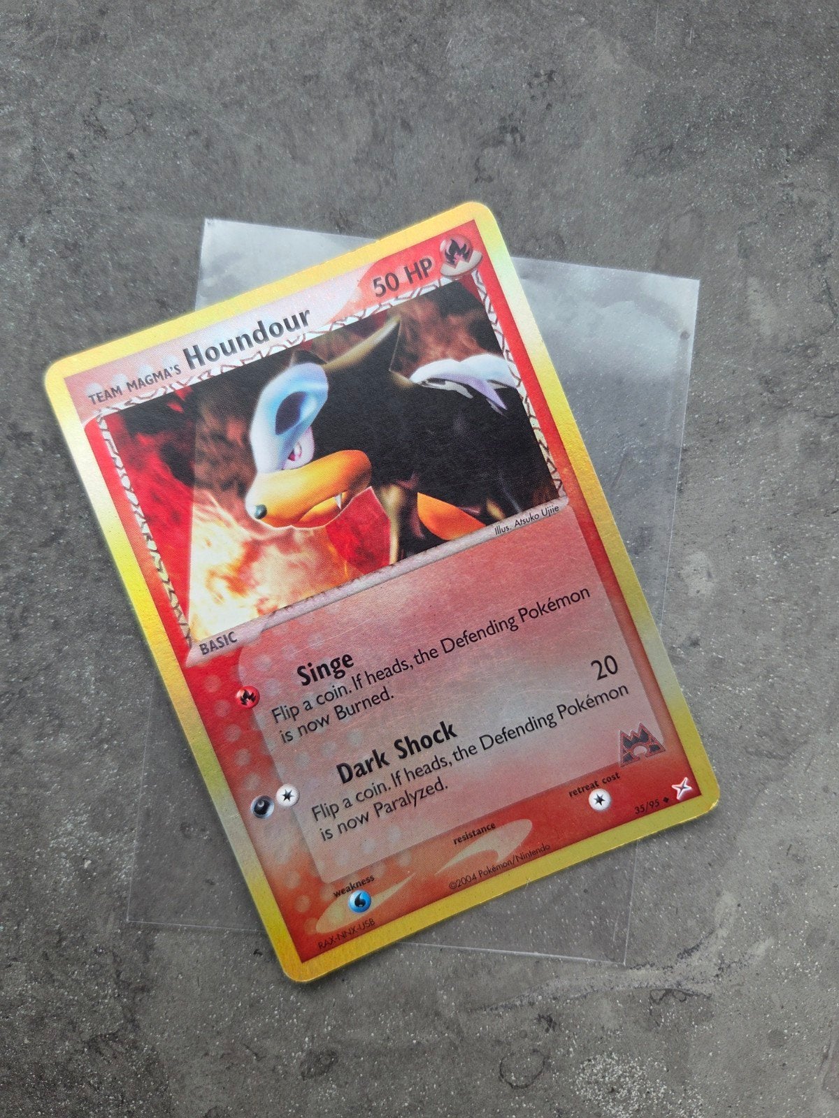 Team Magma's Houndour 35/95 Reverse Holo, Ophalen of Verzenden, Zo goed als nieuw