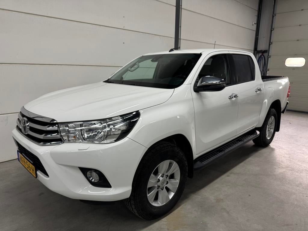 Toyota Hilux 2.4 D-4d 4WD, dubbele Cab, incl BTW en BPM!, Stof, 4 cilinders, Wit, Bedrijf