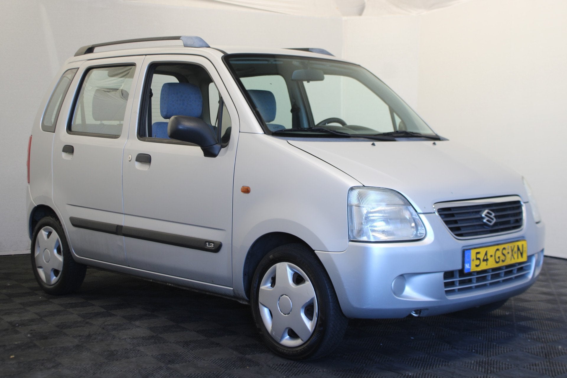 Suzuki Wagon R+ 1.3 GL (bj 2001), Voorwielaandrijving, Stof, Zwart, Origineel Nederlands