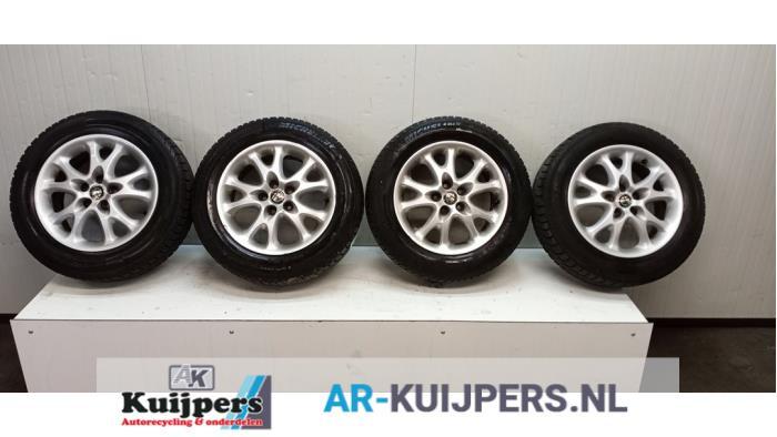 Sportvelgenset + winterbanden van een Alfa Romeo 147, Auto-onderdelen, Banden en Velgen, Gebruikt