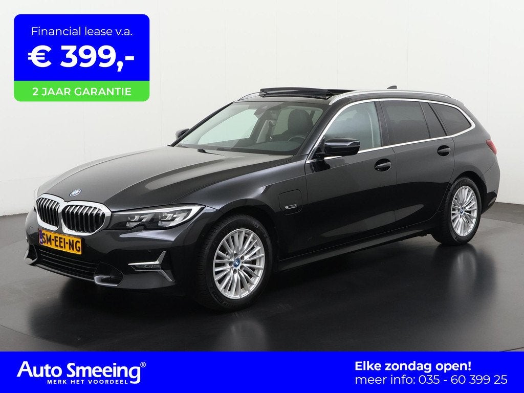 BMW 3-serie Touring 320e Luxury | Panoramadak | Memory Stoel, Auto's, BMW, Gebruikt, Euro 6, 4 cilinders, Zwart
