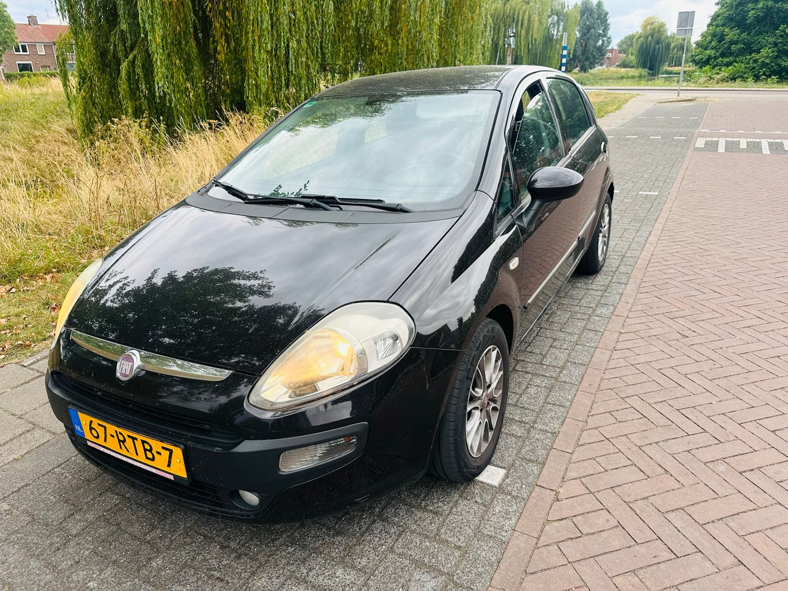 Fiat Punto 1.3 Multijet 62KW 5DR 2011 Zwart, Auto's, Fiat, Voorwielaandrijving, 28 km/l, 4 cilinders, 400 kg