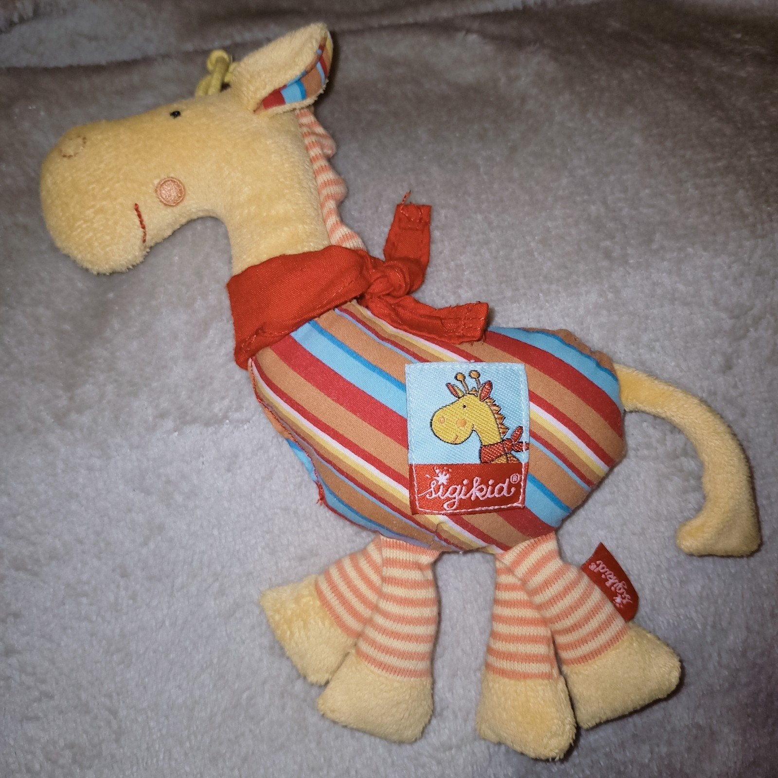 Sigikid giraf rammelaar., Kinderen en Baby's, Speelgoed | Knuffels en Pluche, Giraf, Ophalen of Verzenden, Zo goed als nieuw, Meerkleurig