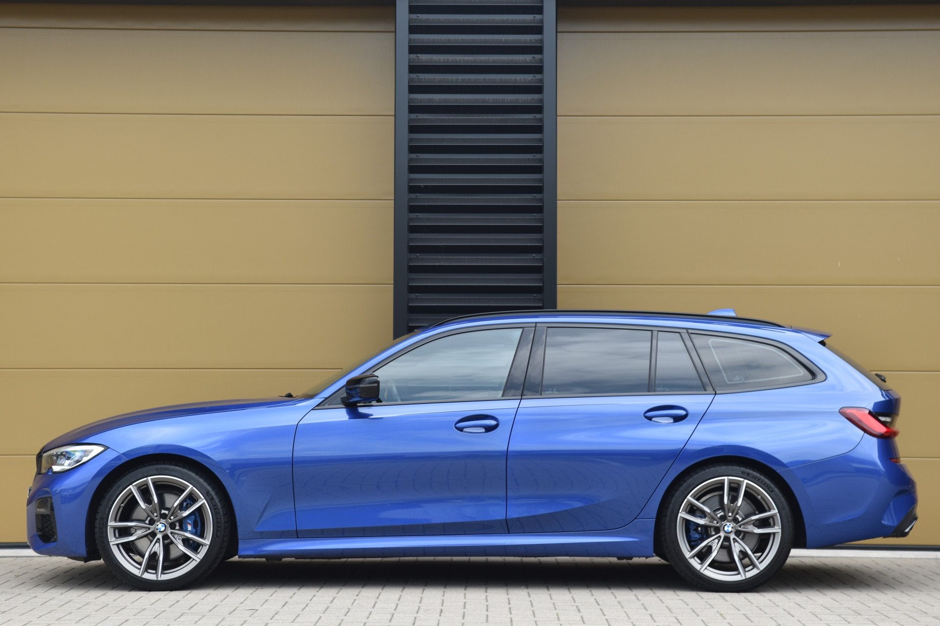 BMW 3 Serie Touring M340i xDrive High Executive * Harman / K, Auto's, Automaat, Met garantie (alle), Blauw, Vierwielaandrijving