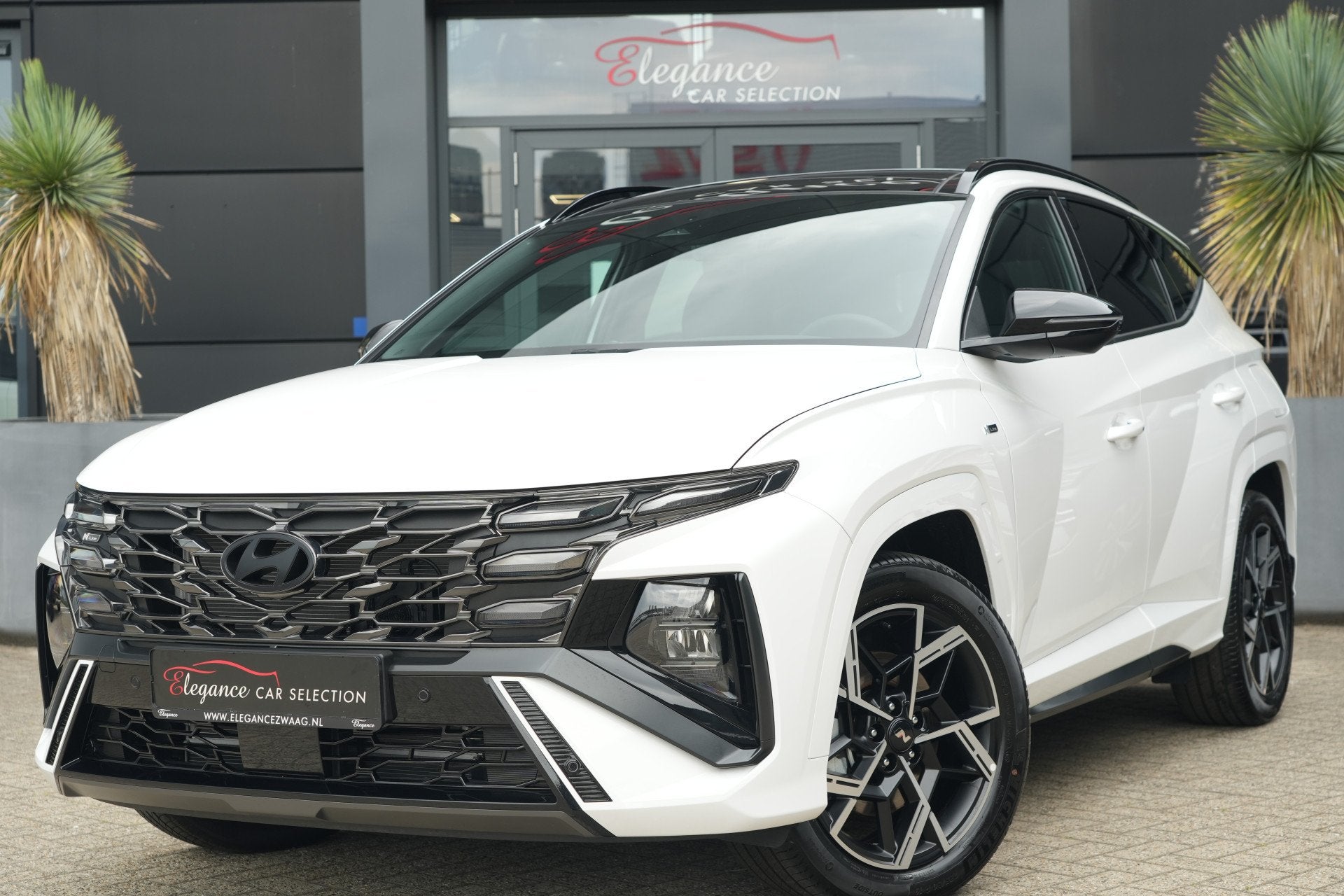 Hyundai Tucson 1.6 T-GDI PHEV N-Line 4WD 288pk Panoramadak/N, Auto's, Automaat, 4 cilinders, Leder en Stof, Wit