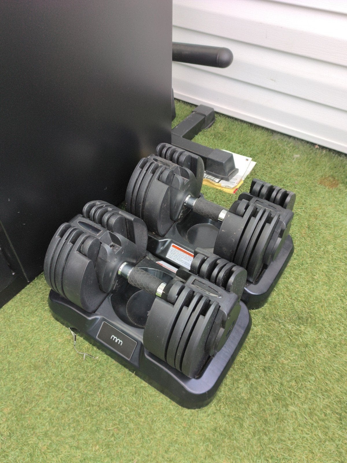 verstelbare dumbells, Ophalen