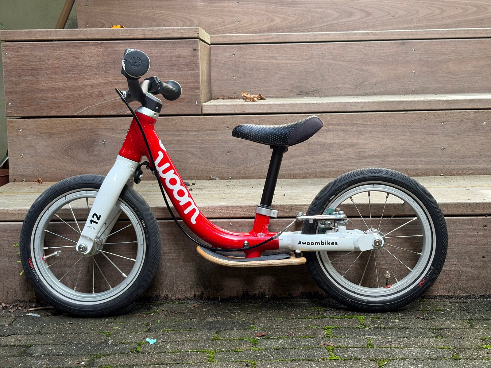Woom 1 loopfiets rood - top condition!, Ophalen, Gebruikt, Velgrem, Minder dan 16 inch
