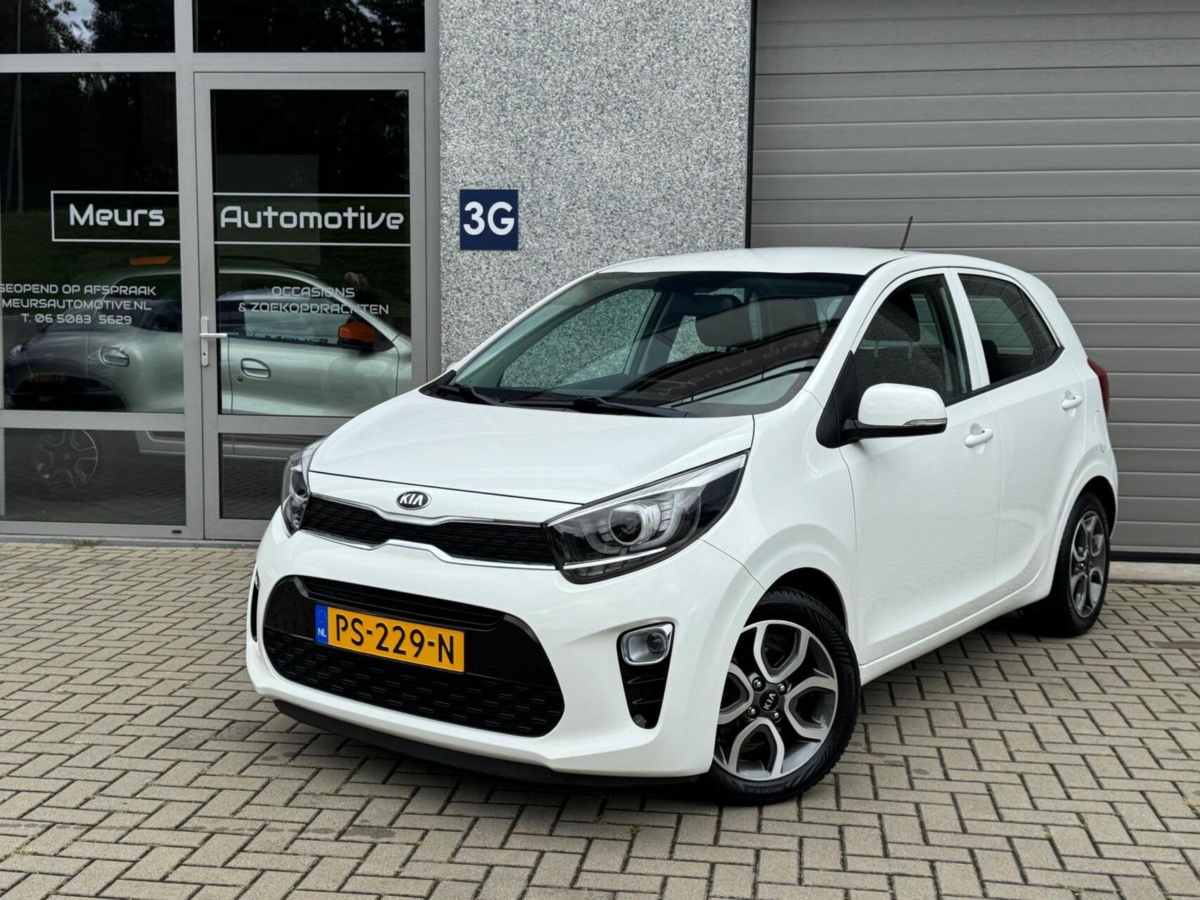 Kia Picanto 1.0 CVVT DynamicPlusLine Cruise/Camera/Navi/CarP, Auto's, Stof, Gebruikt, 4 stoelen, Wit