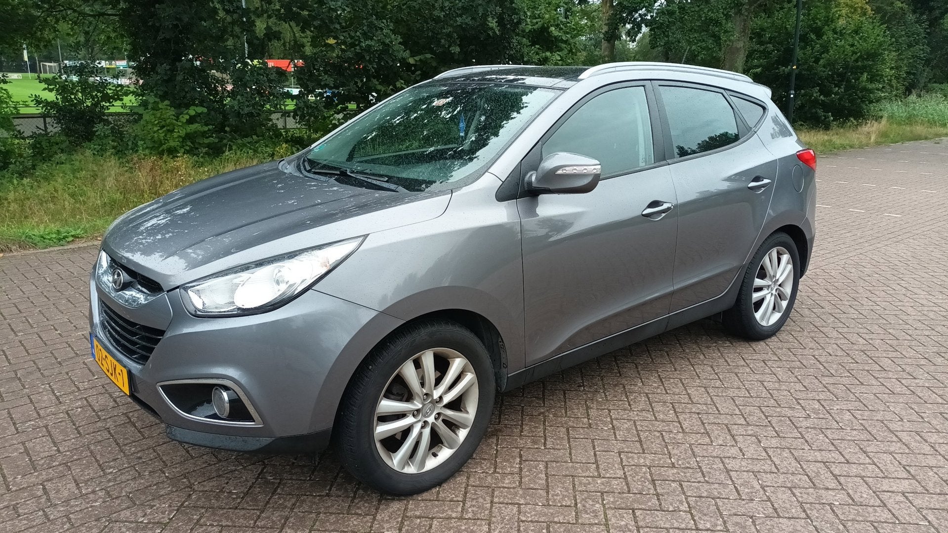 Hyundai Ix35 2.0i Clima / Automaat / Leder, Auto's, Gebruikt, Zwart, 4 cilinders, 1600 kg