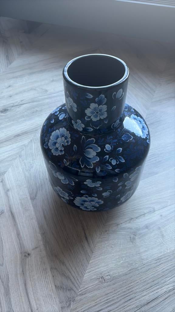 Heinen delfts blauw vaas, Ophalen