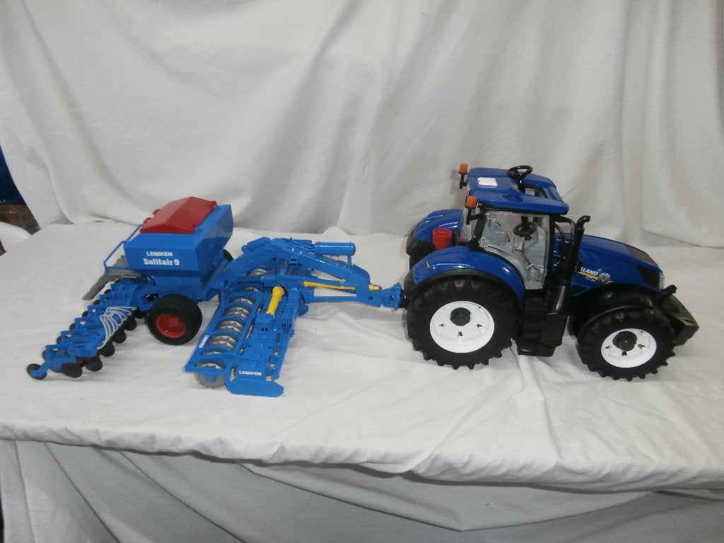 Bruder New Holland T7.315 met Lemken Solitair 9 zaaimachine, Ophalen, Zo goed als nieuw