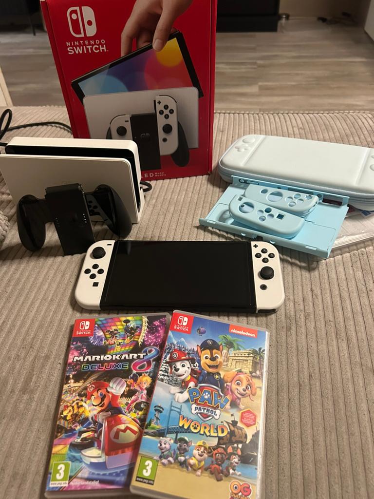 Verkocht! Switch OLED (nieuw) + bon & games, Switch OLED, Met games, Nieuw, Ophalen of Verzenden