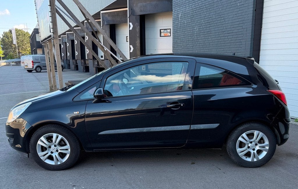 Opel Corsa 1.4-16V White Edition VOLLEDIGONDERHOUD/CRUISE/AI, Voorwielaandrijving, Stof, Gebruikt, Zwart