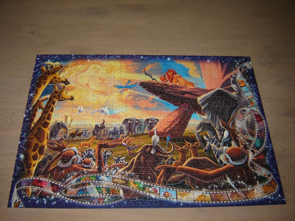 Puzzel Ravensburger DISNEY DE LEEUWENKONING 1000 st., Ophalen of Verzenden, 500 t/m 1500 stukjes, Zo goed als nieuw, Legpuzzel