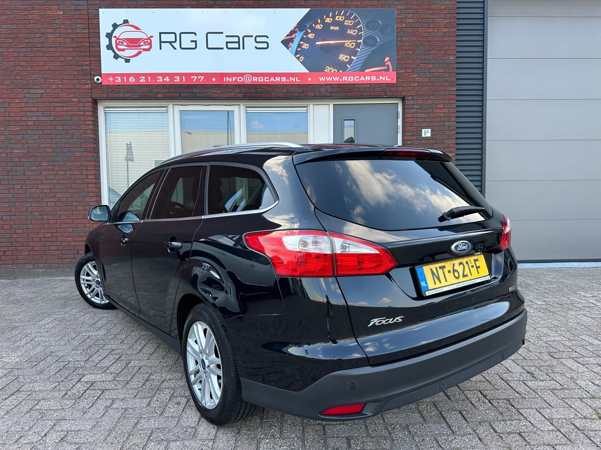 Ford Focus Wagon 1.0 EcoBoost Titanium / Riem vv / Clima / C, Euro 5, Gebruikt, Met garantie (alle), Zwart