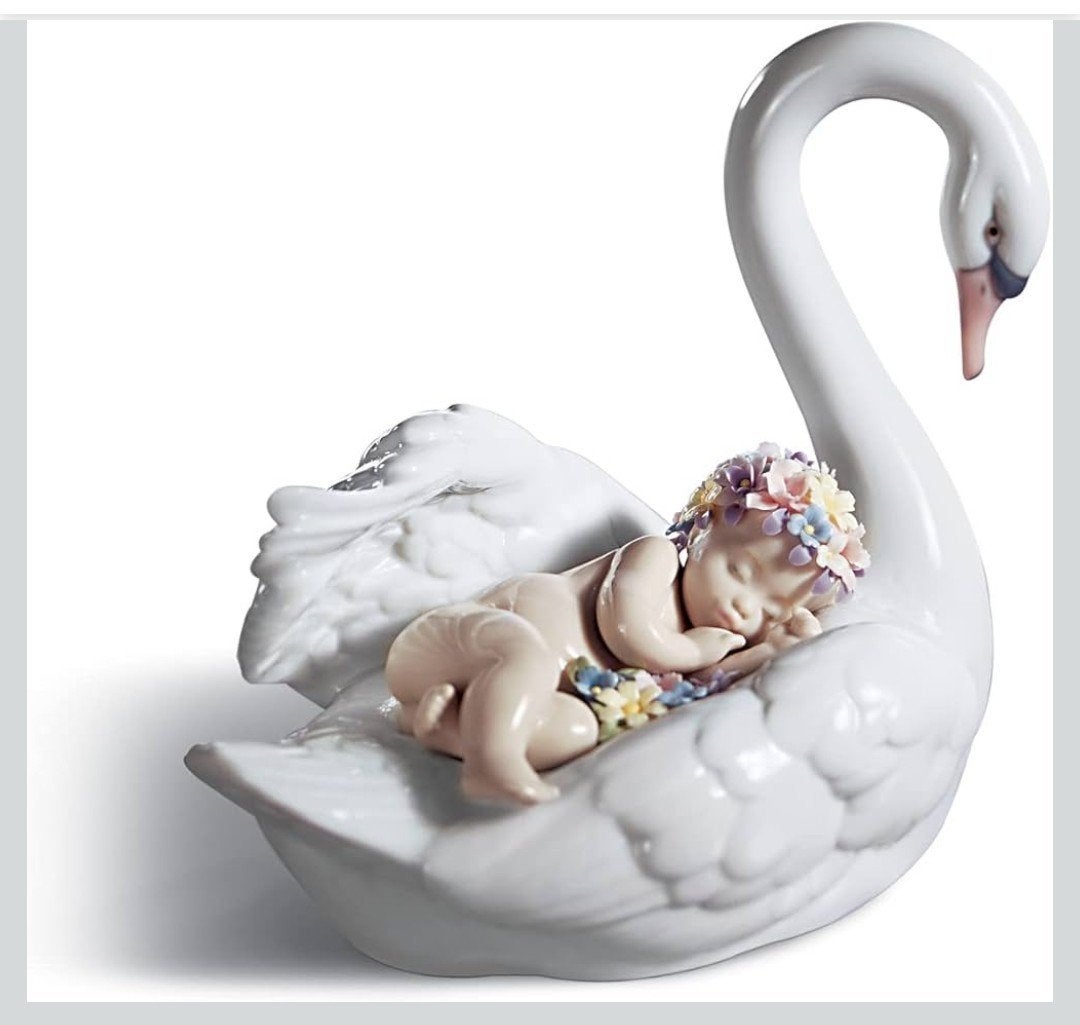 Lladro drifting throug time zwaan met baby, Ophalen of Verzenden