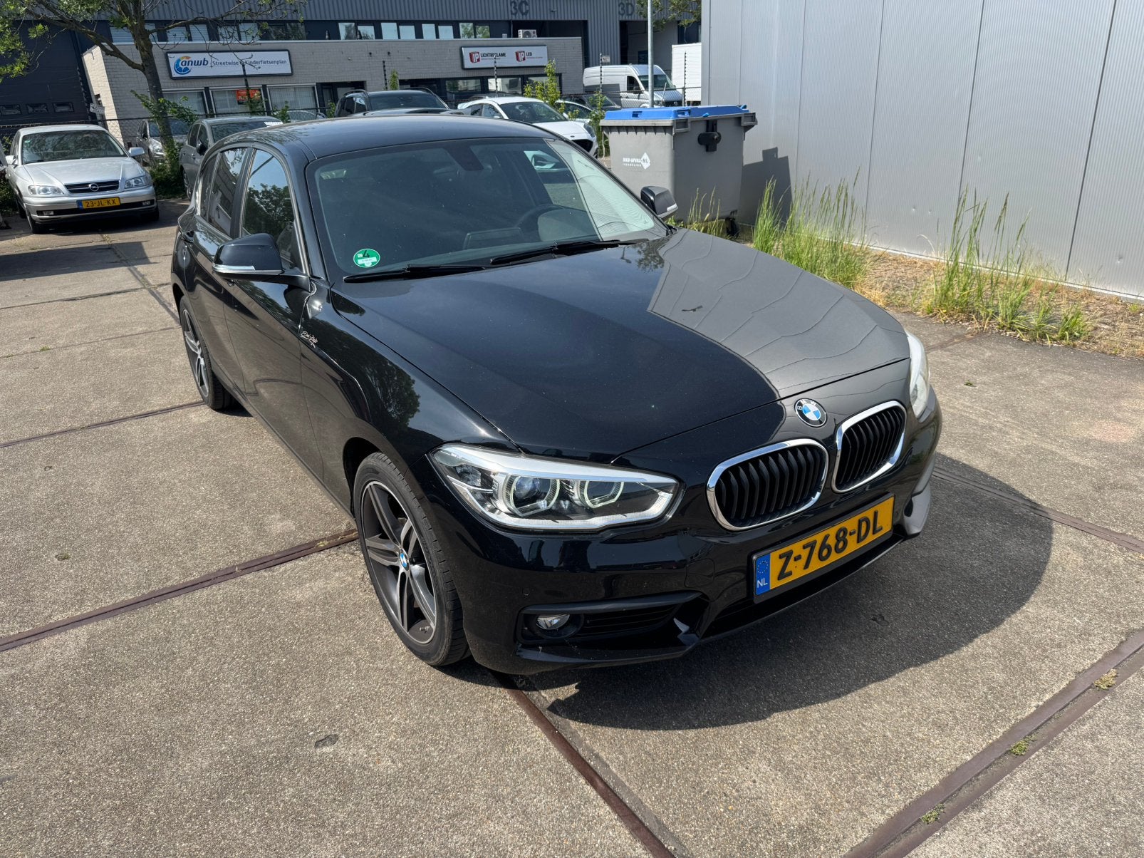 BMW 1-Serie 118i EDE / Stoelverwarming / Led / Automaat, Auto's, BMW, 1295 kg, Zwart, 650 kg, Particulier
