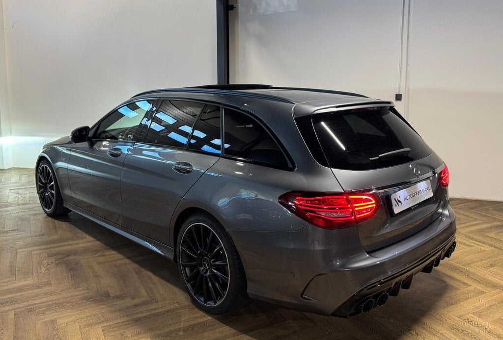Mercedes-Benz C-klasse Estate AMG 43 4MATIC PANO CAM BLINDSP, Auto's, Mercedes-Benz, Gebruikt, Zwart, 390 pk, 4 stoelen