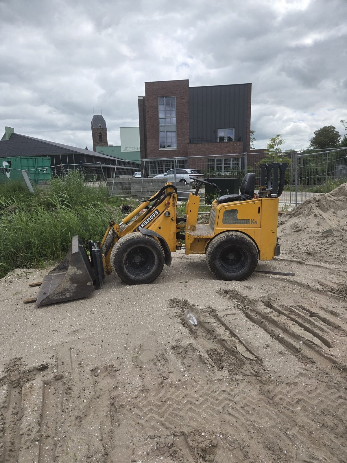 Knikmops 130 shovel/minishovel, Ophalen, Wiellader of Shovel