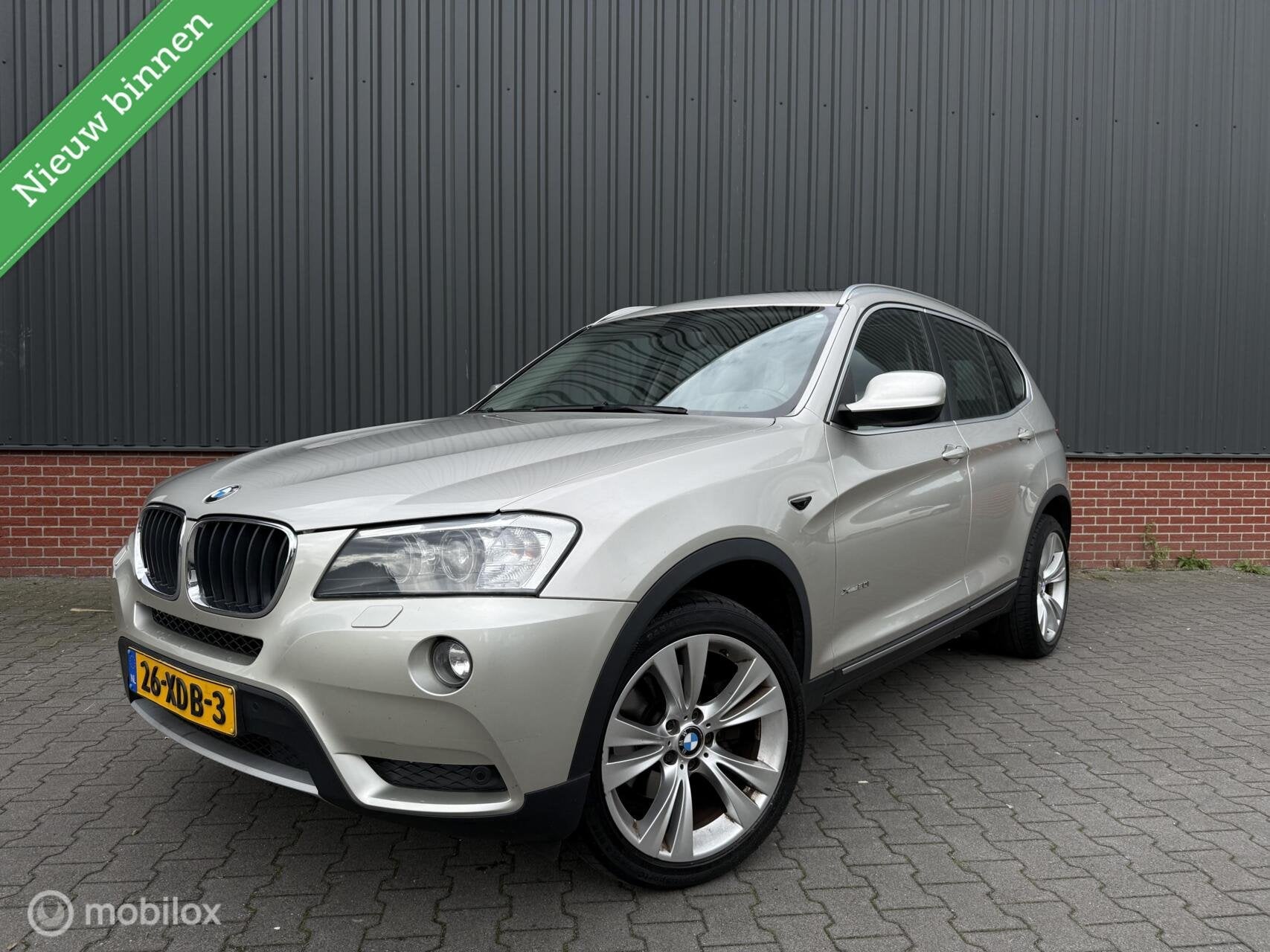 BMW X3 xDrive20i High Executive Aut Panorama Xenon Cruise Le, Euro 5, Gebruikt, 4 cilinders, 2000 kg