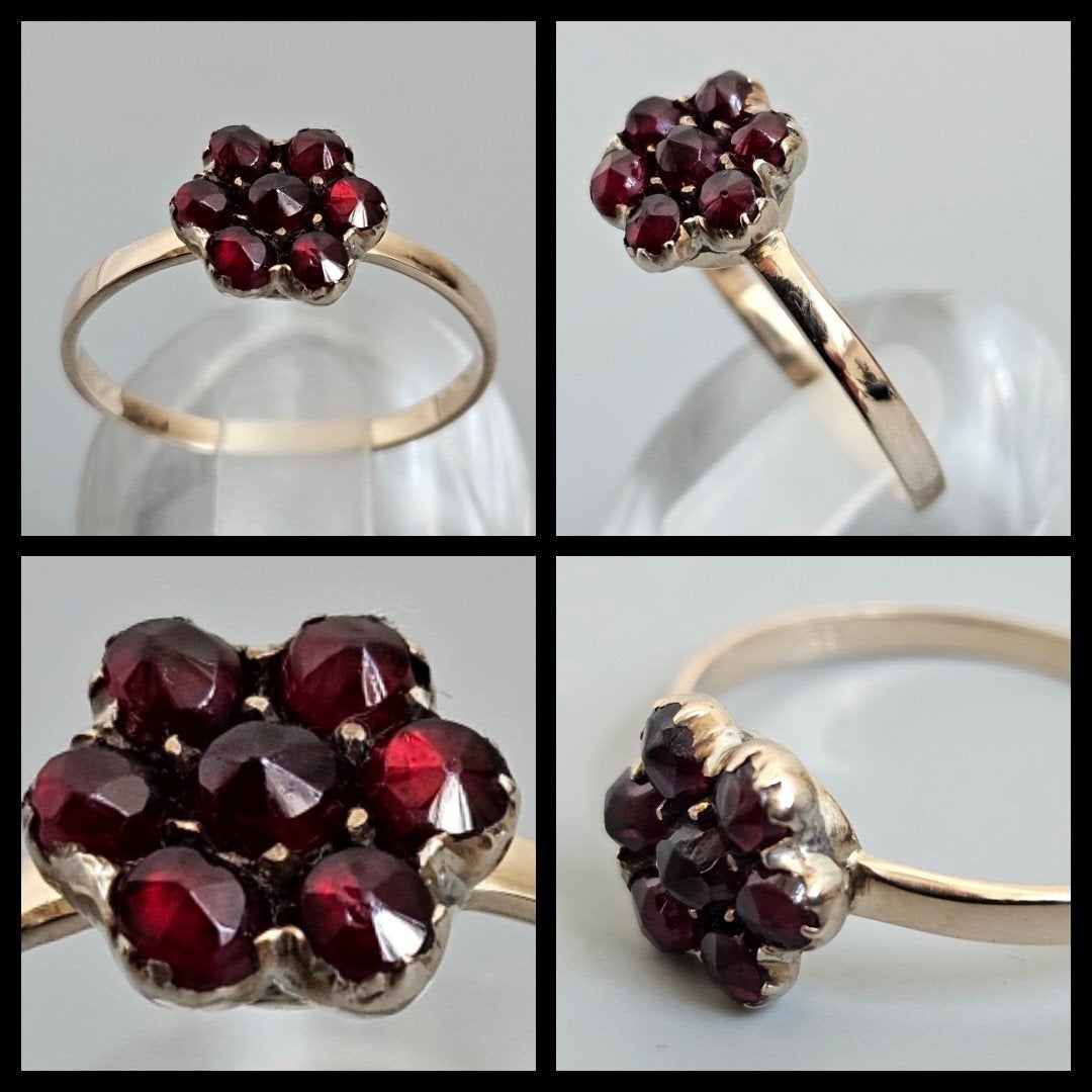 gouden ring met facetgeslepen granaat in bloemvorm, Ophalen of Verzenden, Goud, Ring, Met edelsteen
