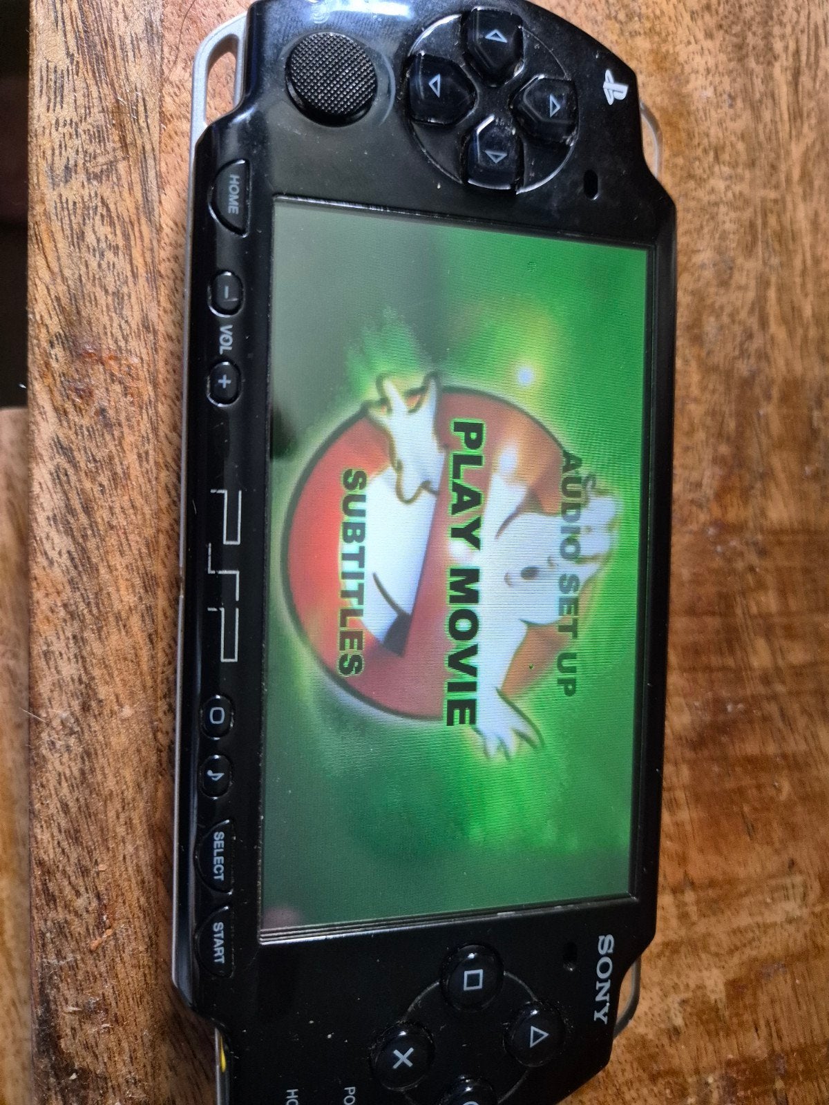 psp model 2004 met lader en games., Gebruikt, Ophalen of Verzenden, PSP, Met games